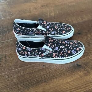 6.5 women’s slip on Vans. Pink and purple flower design on black shoe.